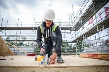 A joiner completing new homes in Renfrewshire