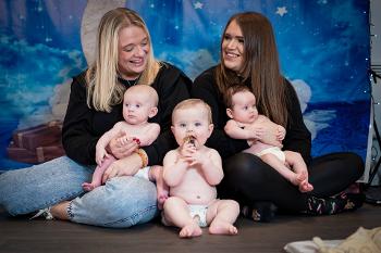 Earth-Moon-Baby owners Gillian McGall holding Mac and Emma McIvor with Blair and Mirren in the foreground