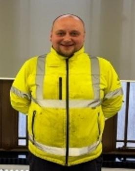 Image of staff member wearing high-vis jacket