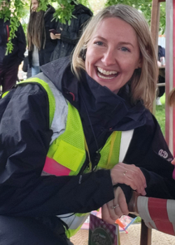 Suzi MacIver from events team sitting facing camera