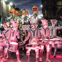 Spark! LED Drummers perform in the parade as part of Paisley Halloween Festival
