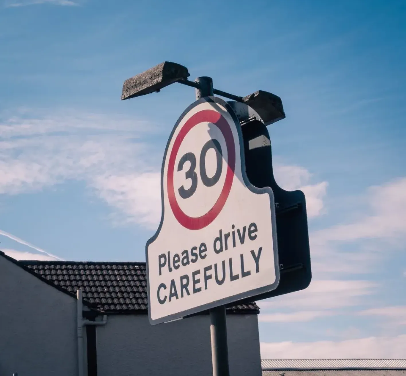 Please drive carefully roadsign