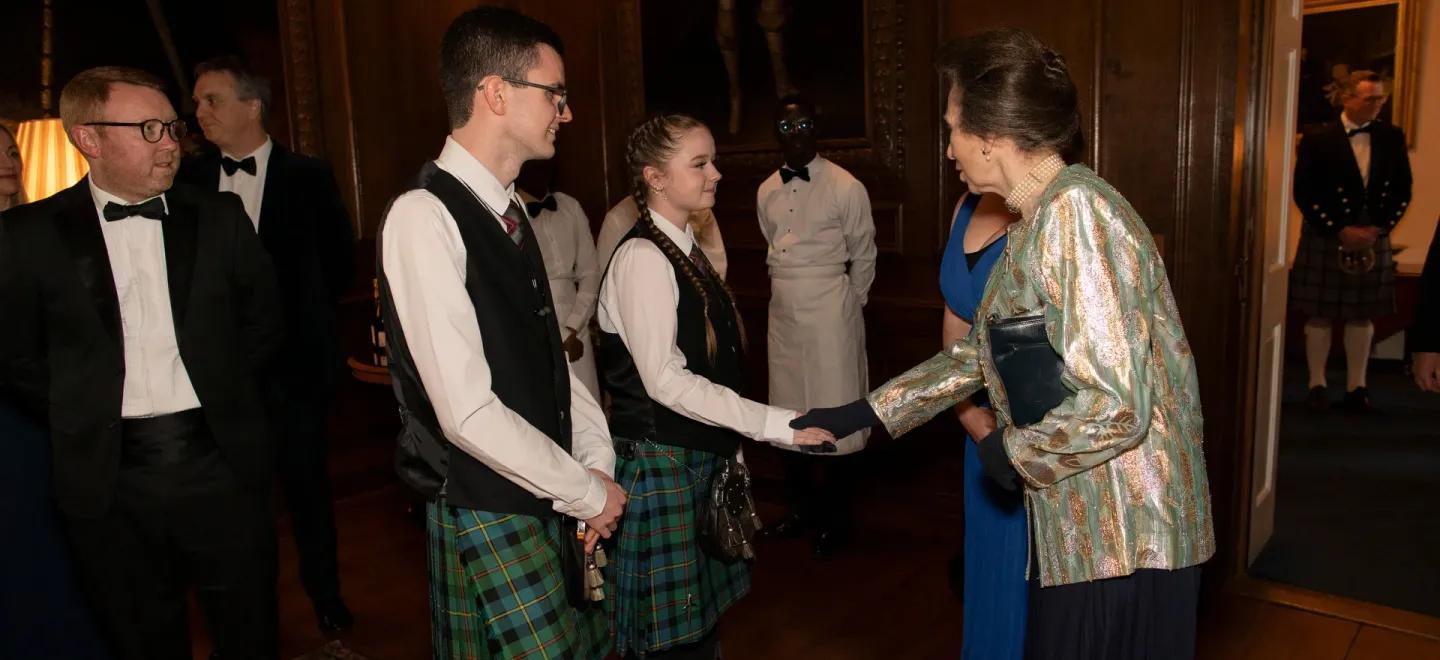 Kaitlyn McCurday shakes hands with HRH The Princess Royal