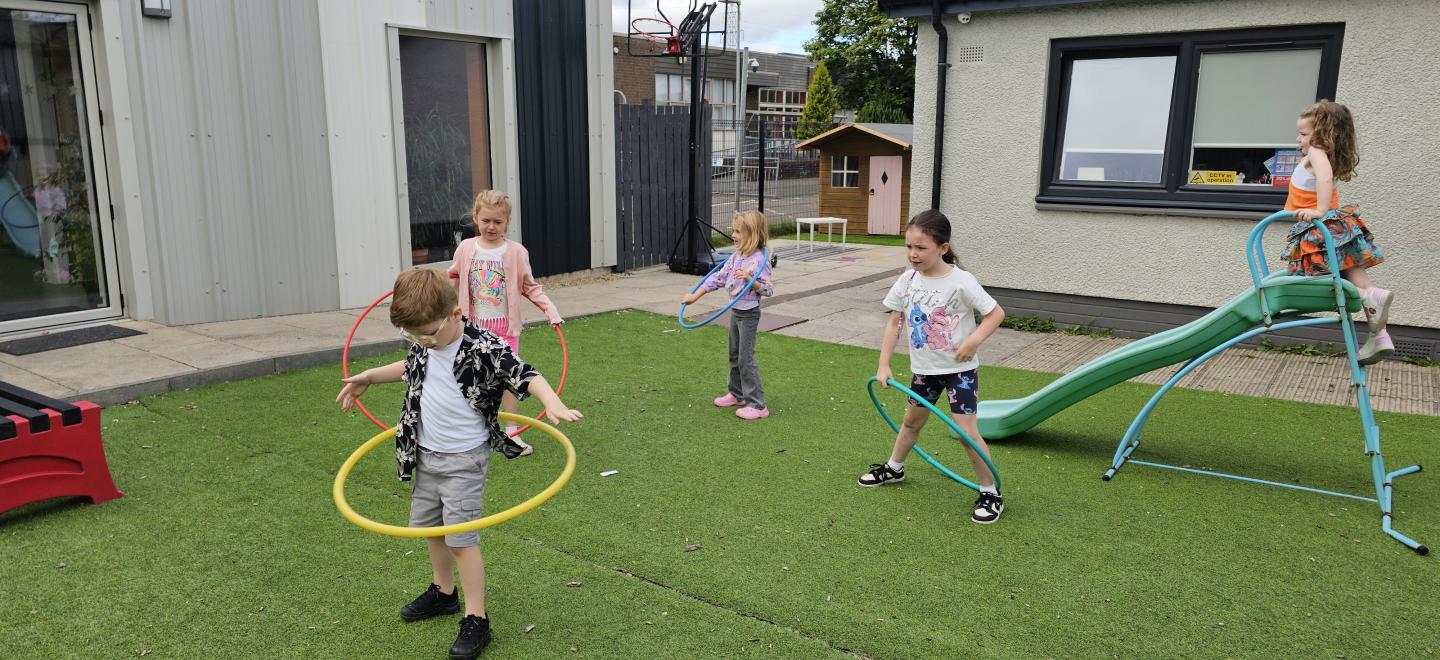 Kids having outdoor fun at KLAS Care in Linwood