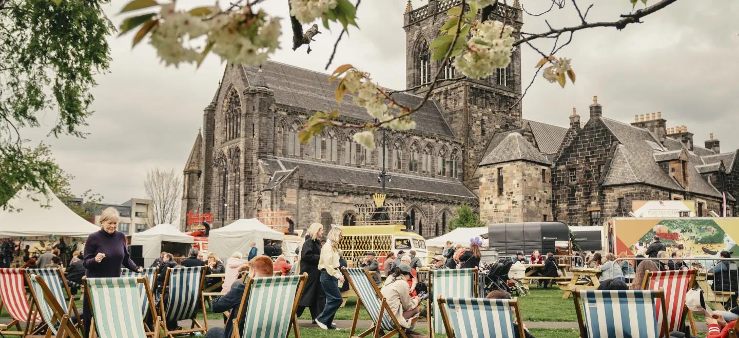 People enjoying Paisley Food and Drink festival in Abbey close