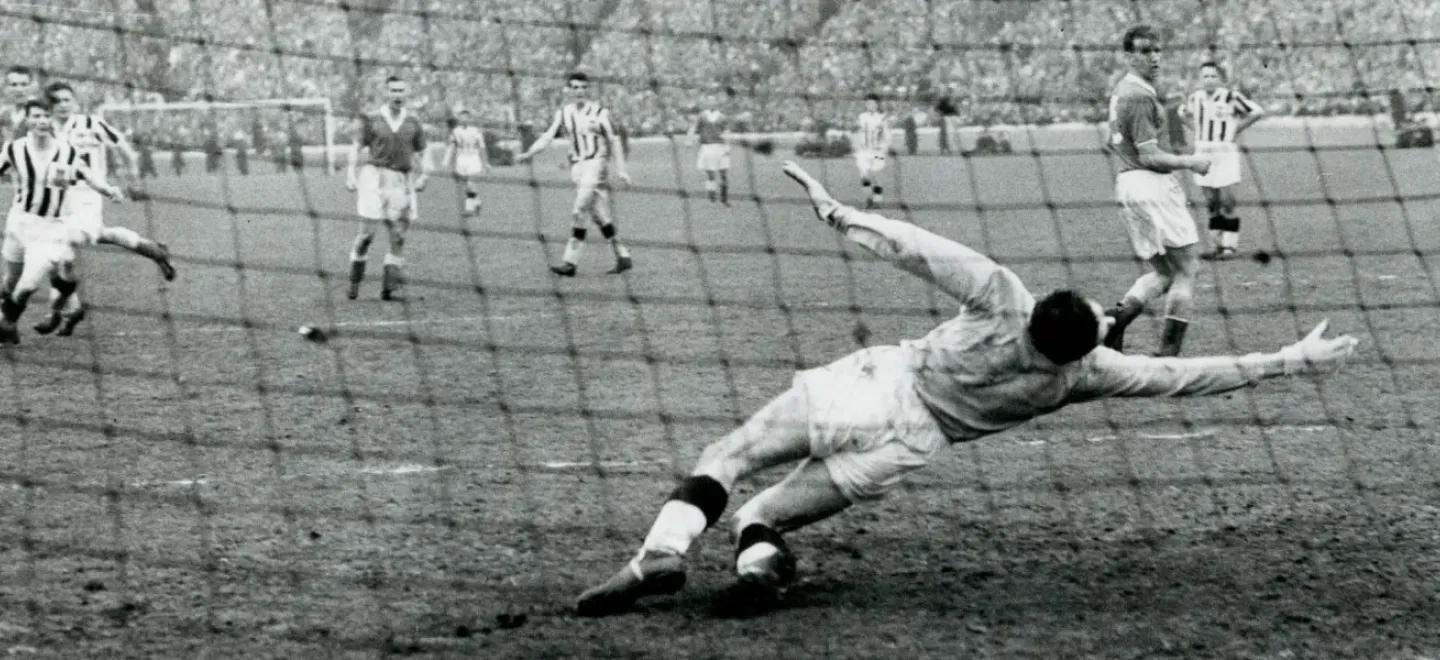 Ally Miller scoring for St Mirren in their 3-1 victory over Aberdeen in 1959 at Hampden Park, with a packed crowd