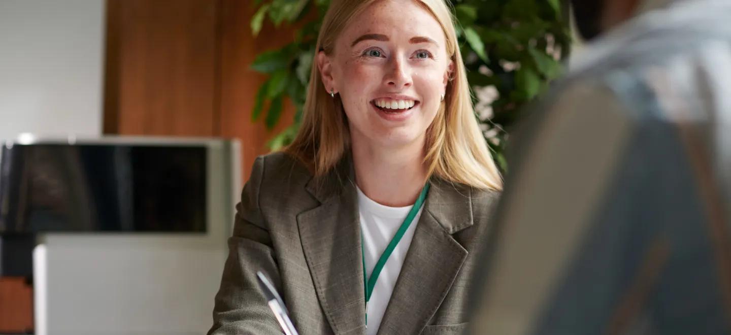 Young woman in interview in smart clothing